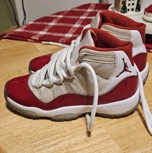 Jordan 11's Cherry Red And White. Size 4 Y. Good Condition.